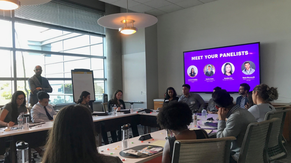Students listening to a panel of Accenture employees in Los Angeles.
